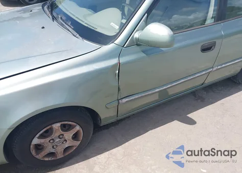 2004 Hyundai Accent Gl z USA, uszkodzony, nr VIN KMHCG45C54U540120